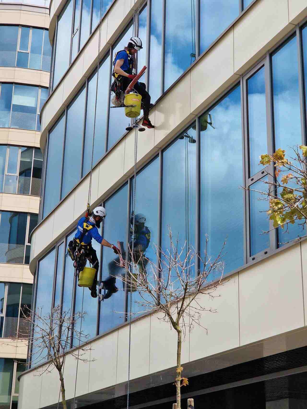 window cleaners cleaning high rise building window cleaners cleaning high rise building