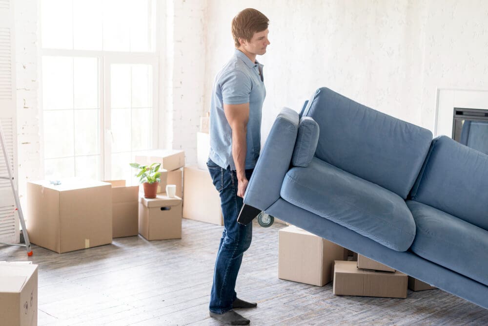 man moving furniture